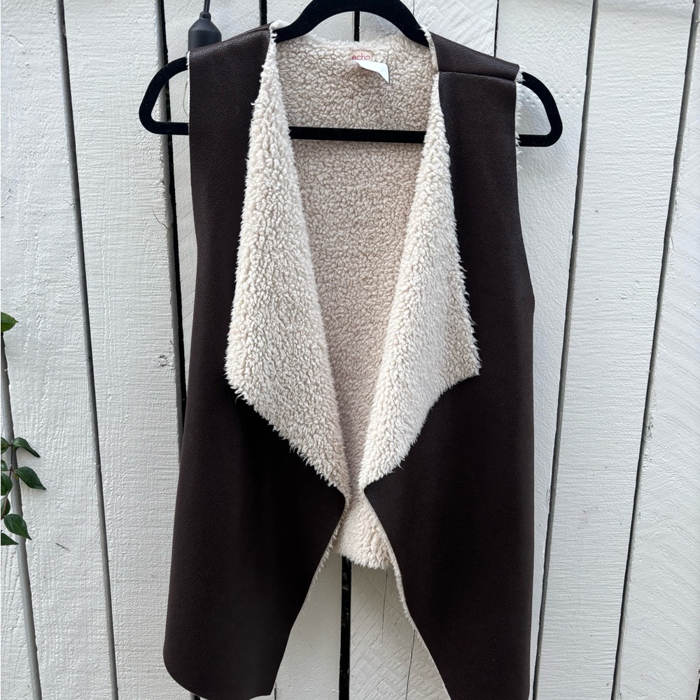 Faux leather fleece vest